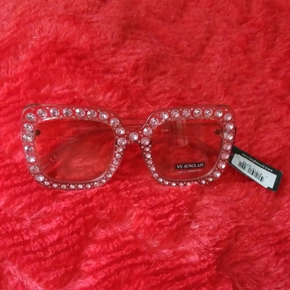Pink rhinestone trimmed sunglasses